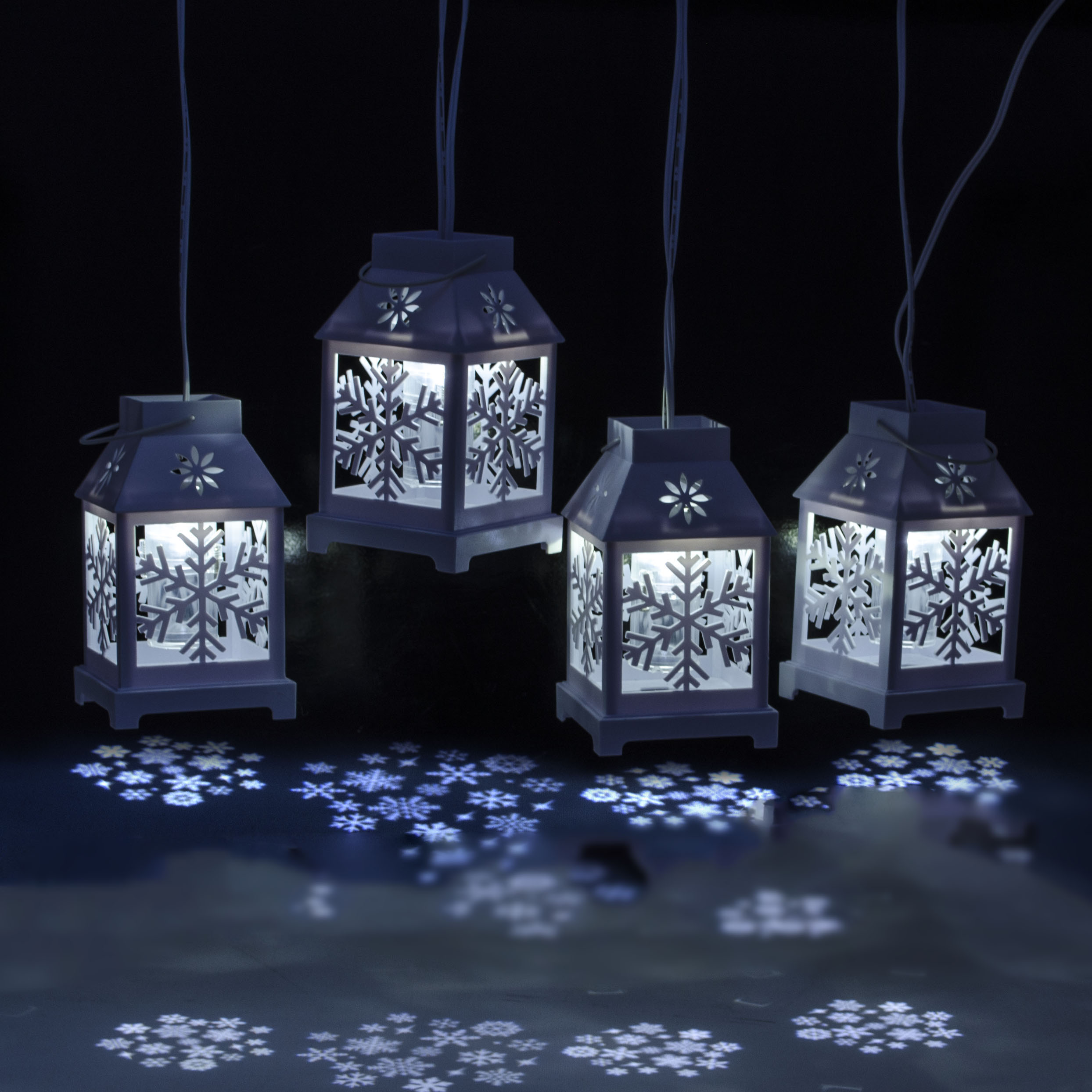 X4-Life LED Lichterkette | 4 Laternen mit Schneeflocken-Projektor | Netzstecker