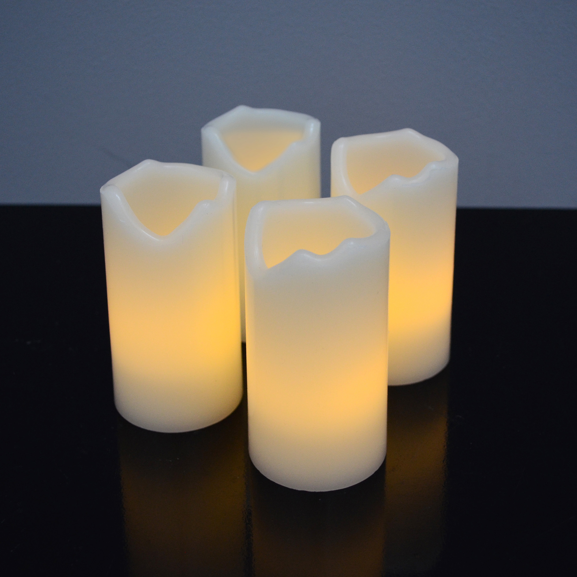 X4-LIFE LED Kerzen mit Fernbedienung, 4er-Set Echtwachskerzen, inkl. Batterie, flackernde Kerzenflamme, 10cm
